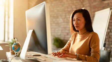 Technical Writer at her desk