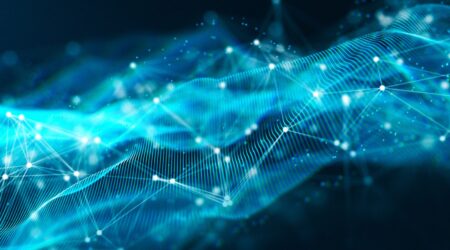 Abstract digital cloud network with glowing blue lines and data nodes on a dark background.