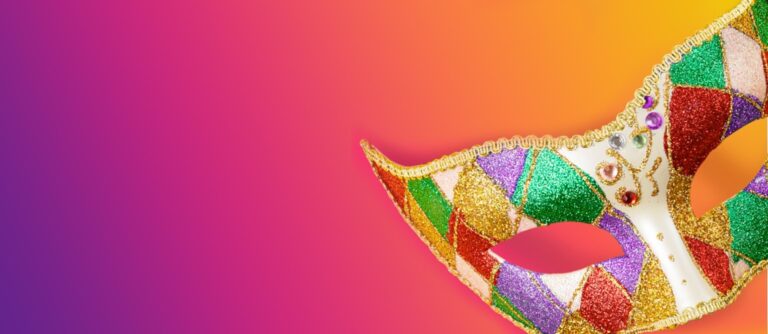 Colourful mask on a vibrant orange and purple gradient background.
