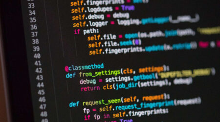 A close-up view of code displayed on a computer screen, showcasing syntax highlighting in various colors.