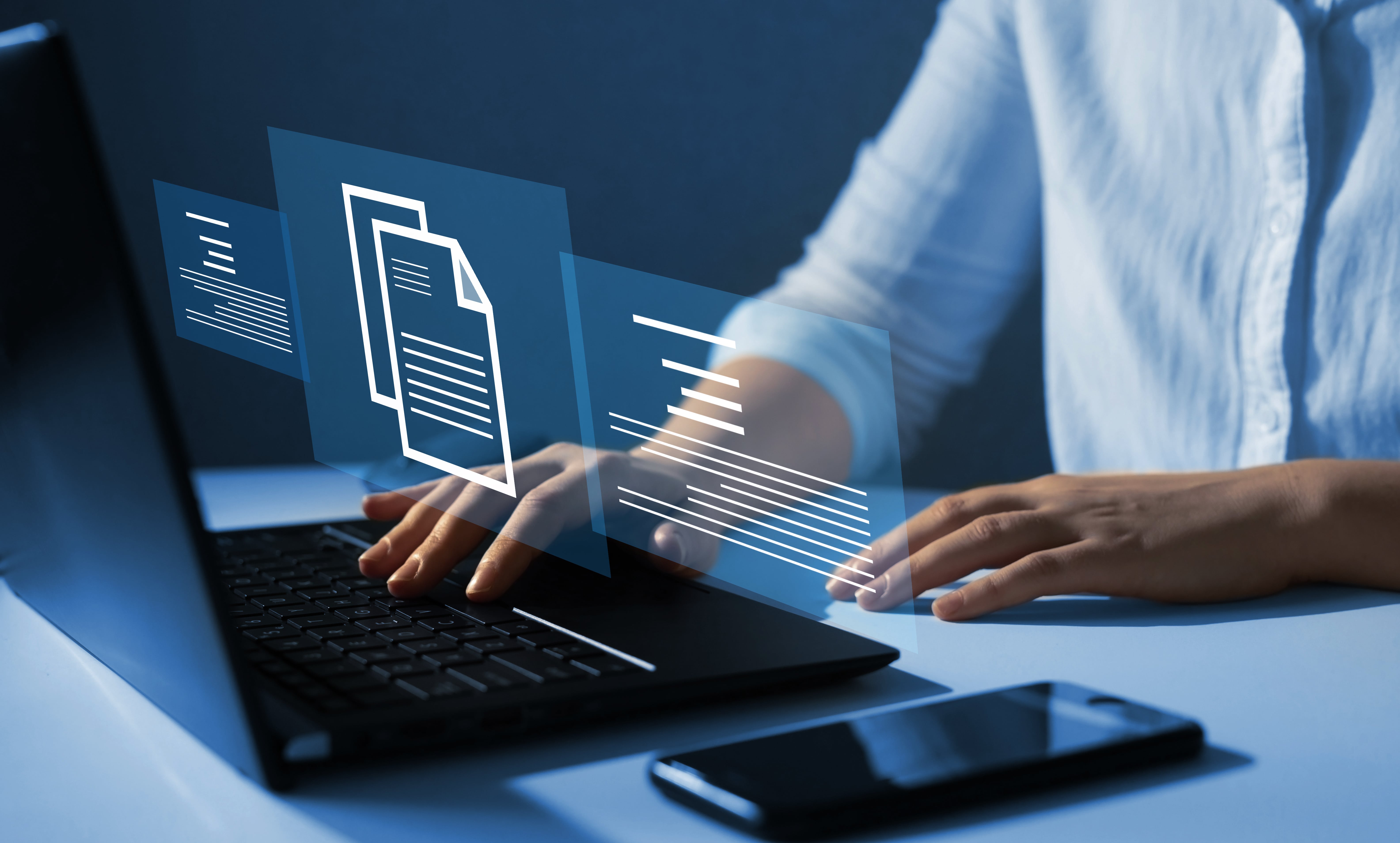 digital file with sub topics and hands on keyboard.