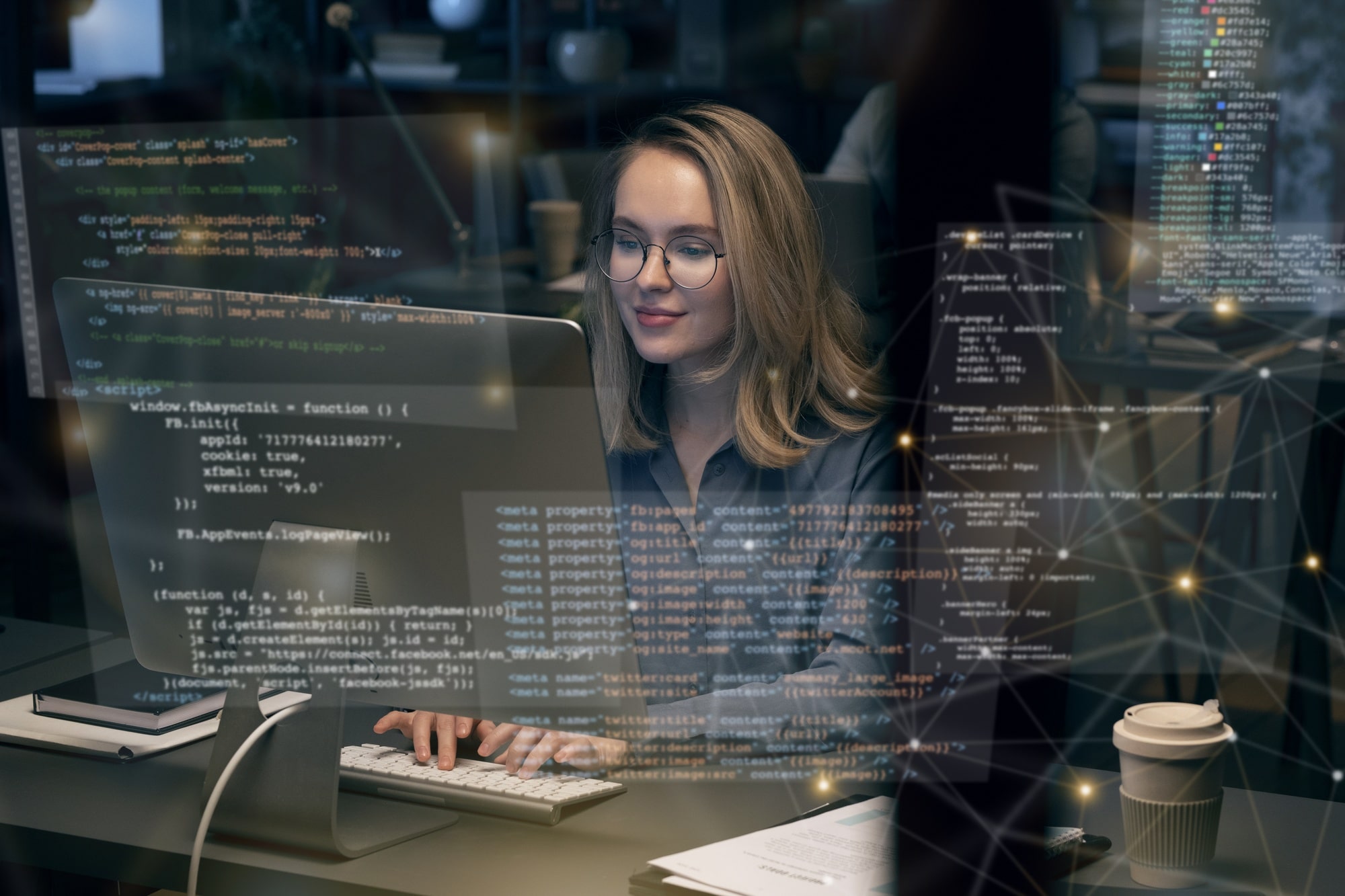 woman on computer surrounded by code tags.